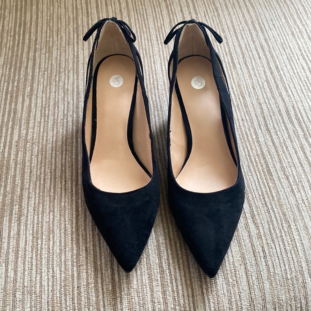 Ladies suede like material, about inch heel.